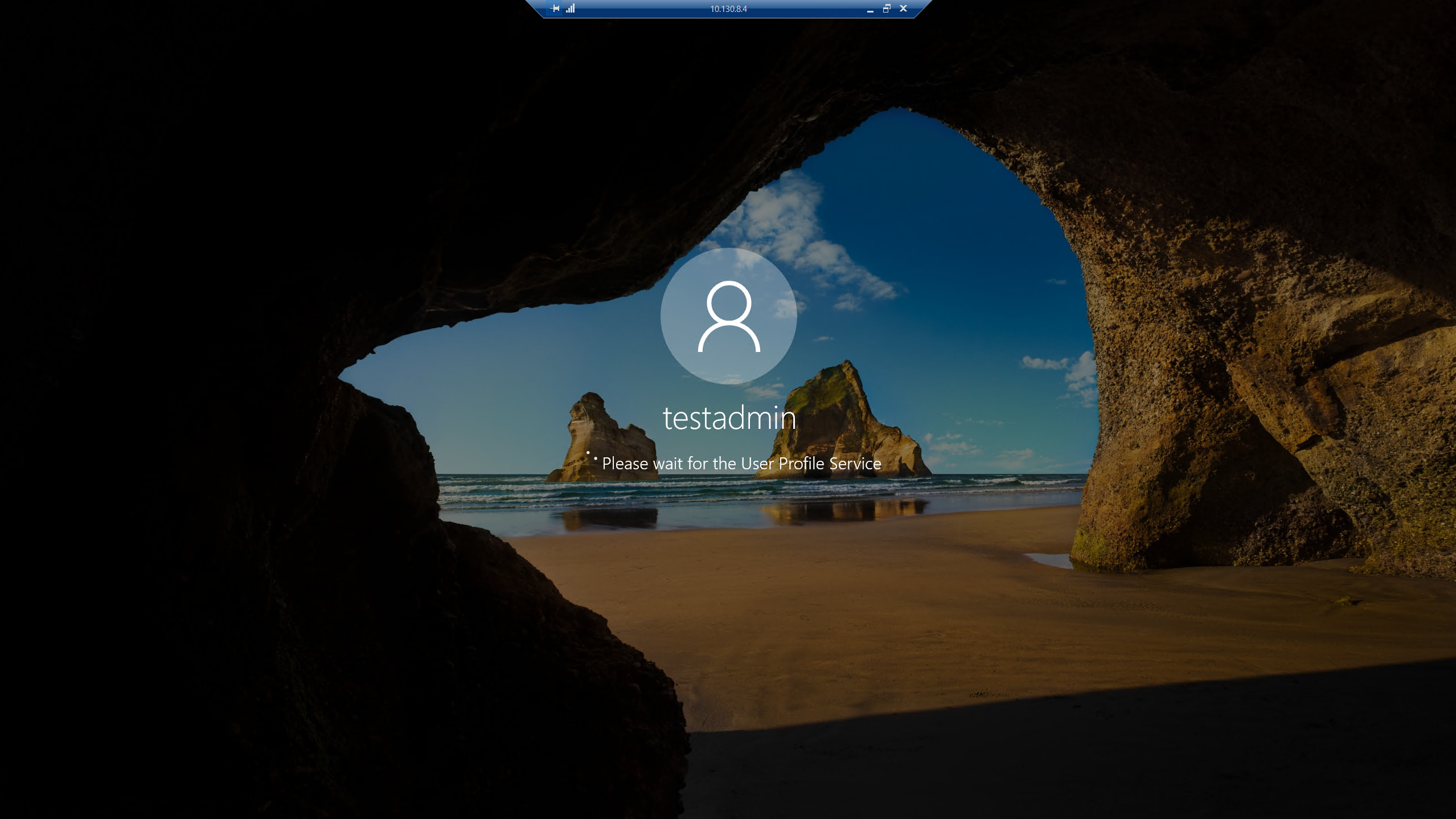 A cave on a beach
Description automatically generated